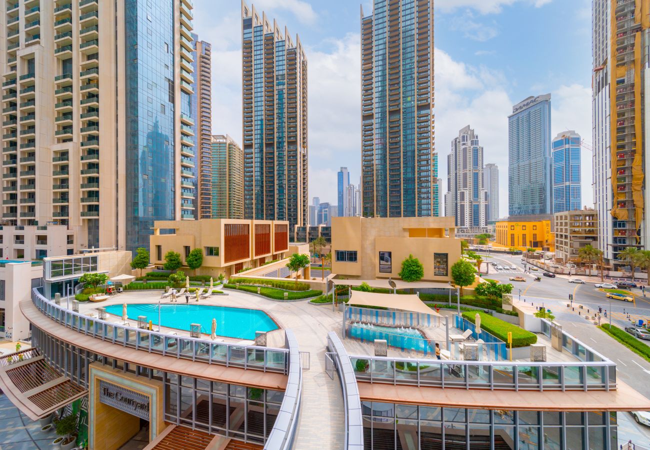 Apartment in Dubai - Charming 2BR Apt at Opera Grand